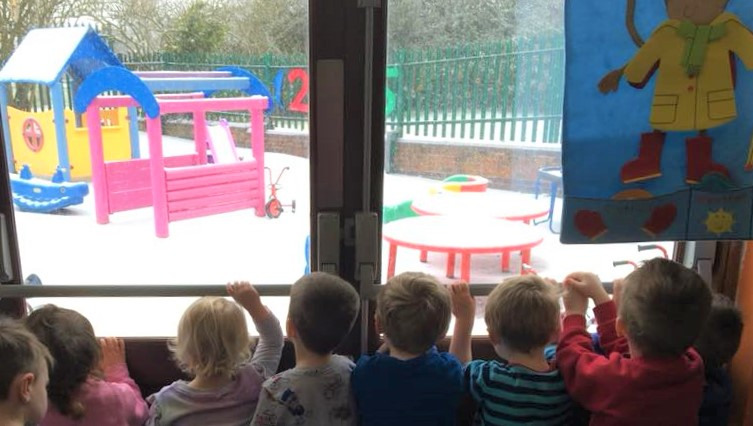 Snow day in the garden at Wigmore Under Fives pre-school, Luton