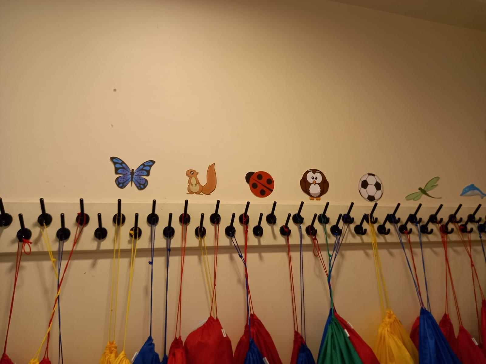 Children's coat pegs at Wigmore Under Fives pre-school, Luton